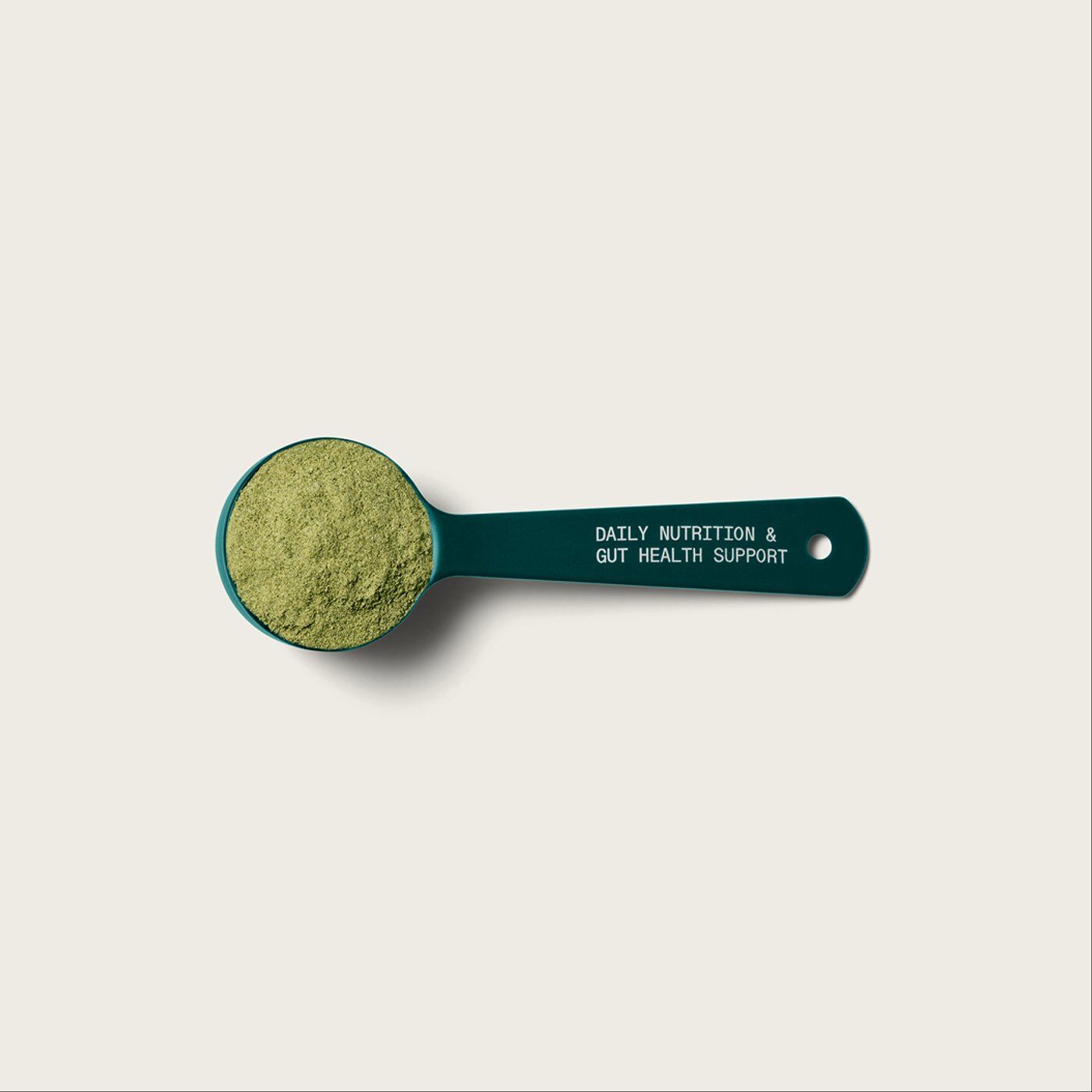 The AG1 scoop filled with powder