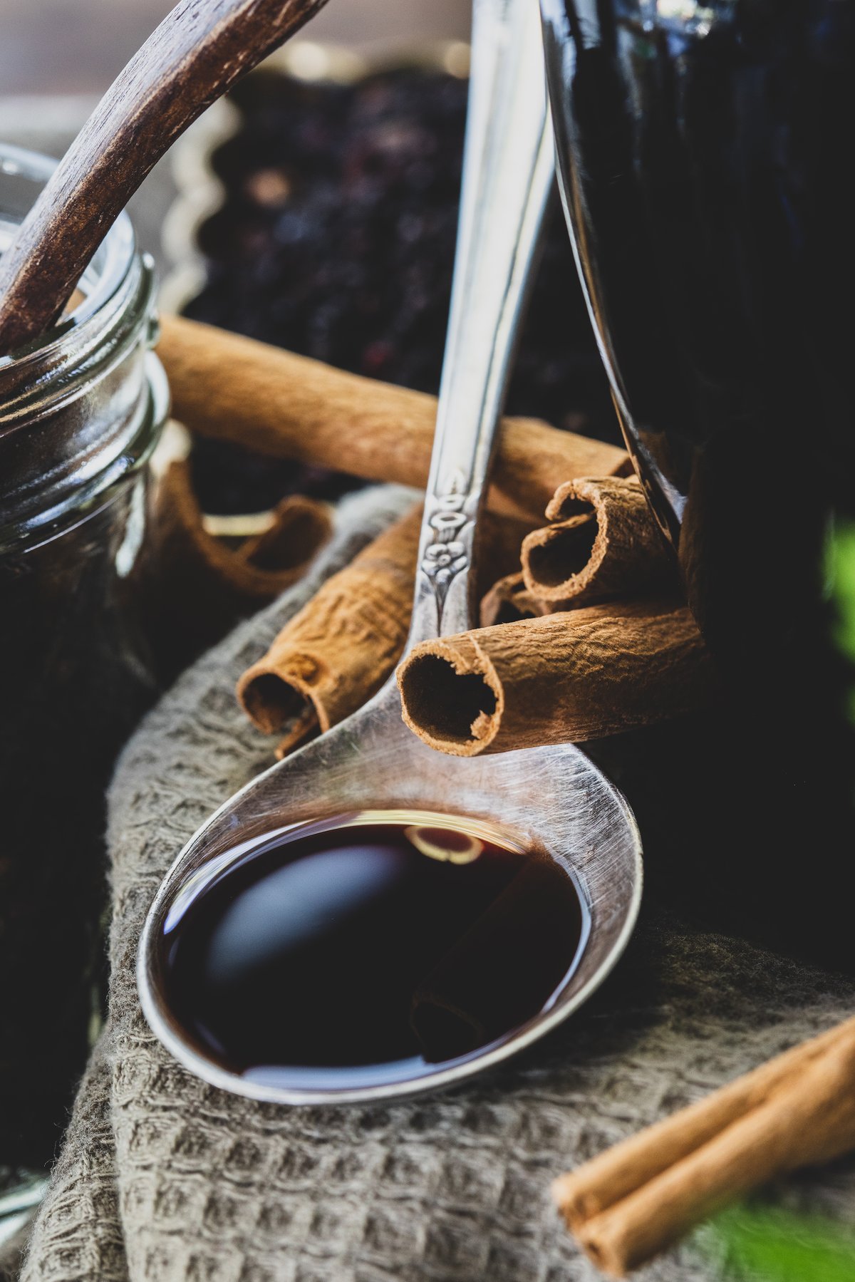 Straining and pressing elderberries for concentrated botanical juice